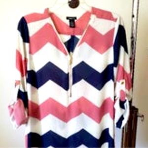 Put a 21 zip up blouse Large